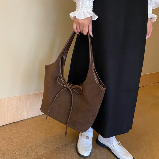 Chic Suede Shoulder Bag with Bow Detail