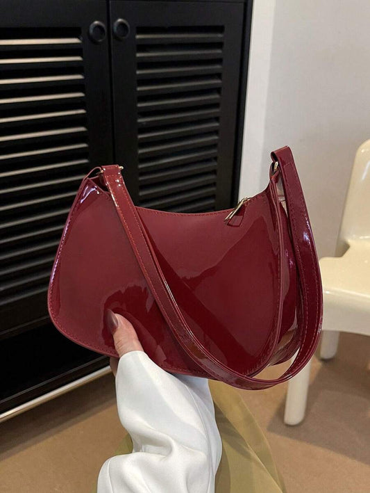 Sleek Leather Shoulder Bag with Gold Hardware