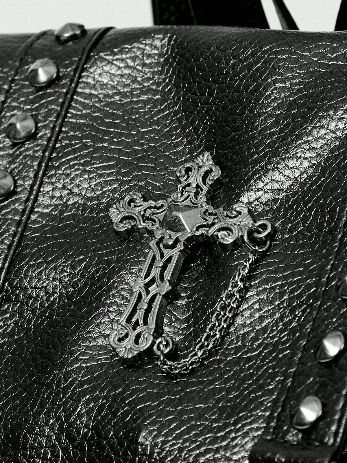 Black Leather Backpack with Studded Straps and Cross Detail