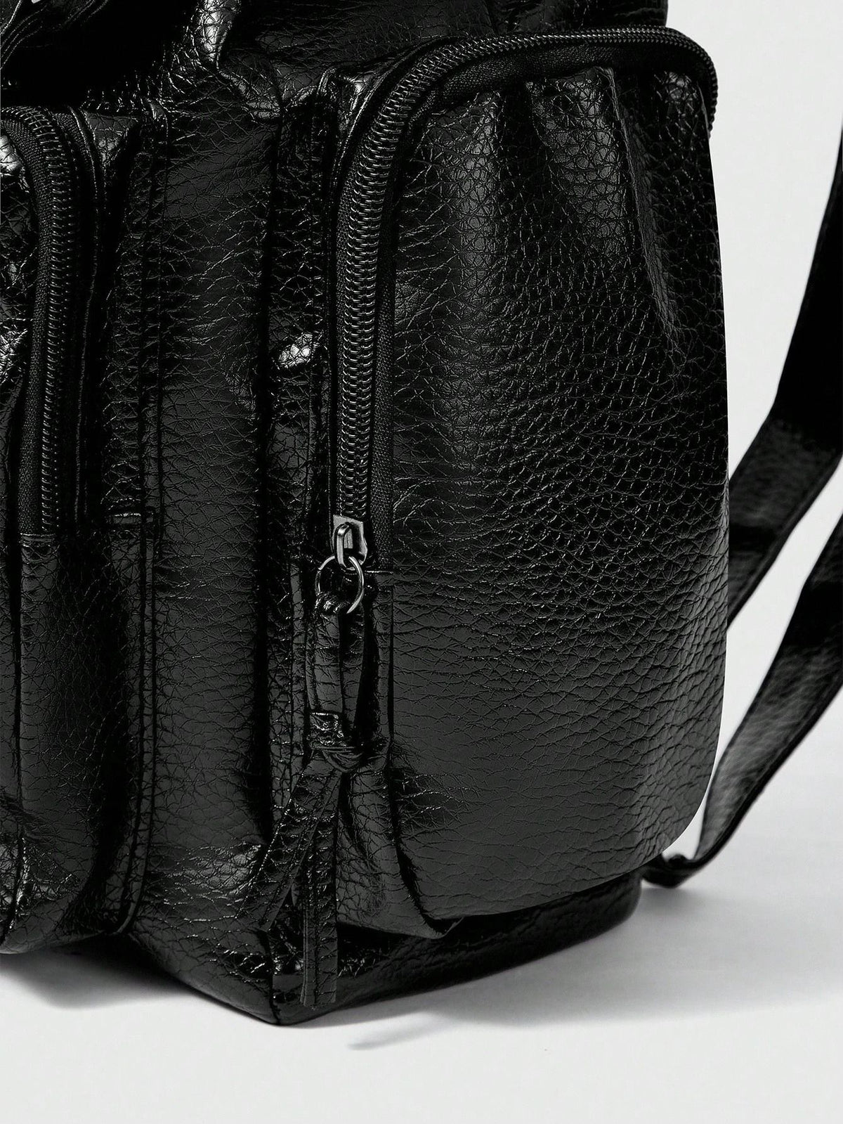 Black Leather Backpack with Studded Straps and Cross Detail