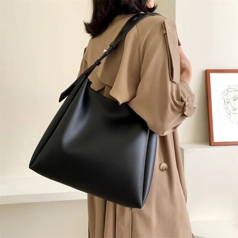 Black Leather Shoulder Bag with Adjustable Buckle Strap
