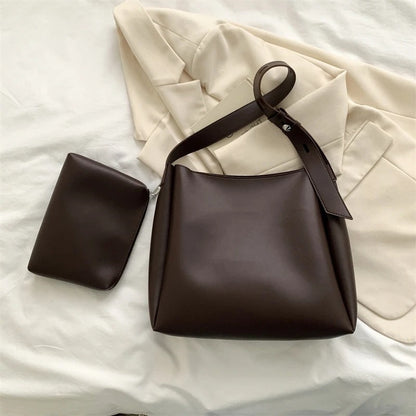 Black Leather Shoulder Bag with Adjustable Buckle Strap