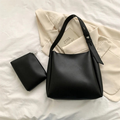 Black Leather Shoulder Bag with Adjustable Buckle Strap