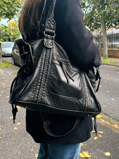 Black Leather Shoulder Bag with Woven Trim and Antique Hardware
