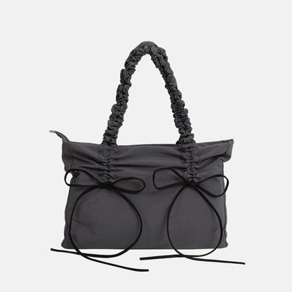 Black Shoulder Bag with Ruched Handles and Bow Detail