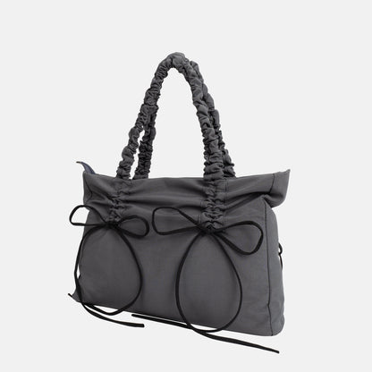 Black Shoulder Bag with Ruched Handles and Bow Detail