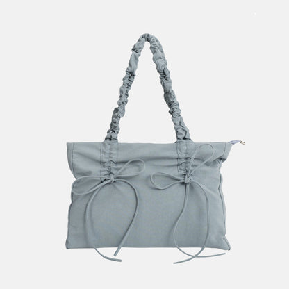 Black Shoulder Bag with Ruched Handles and Bow Detail