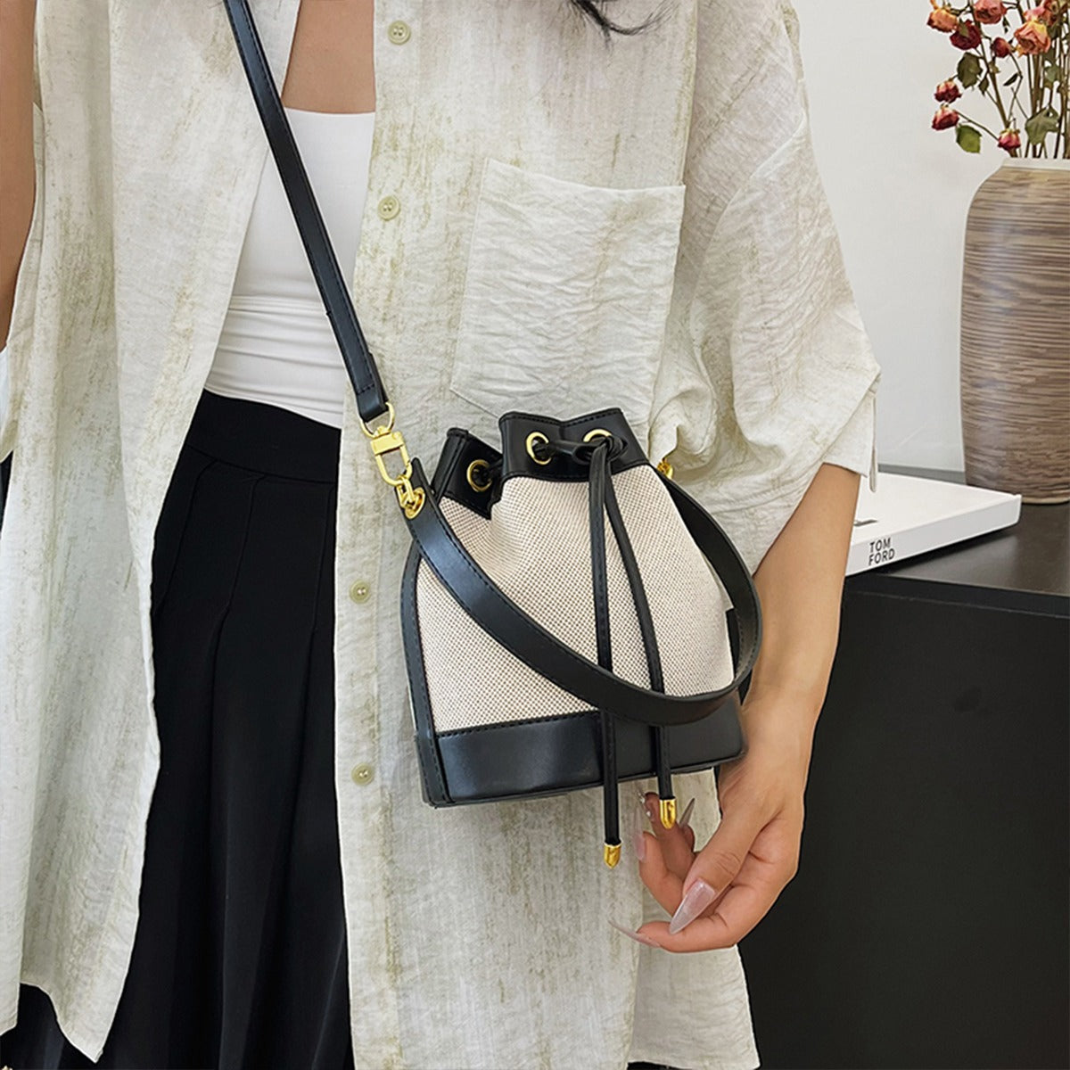 Canvas and Leather Bucket Bag with Drawstring and Gold Hardware