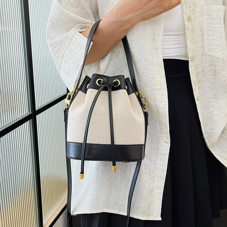 Canvas and Leather Bucket Bag with Drawstring and Gold Hardware