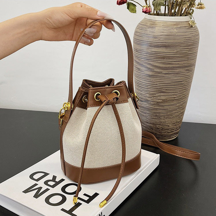 Canvas and Leather Bucket Bag with Drawstring and Gold Hardware