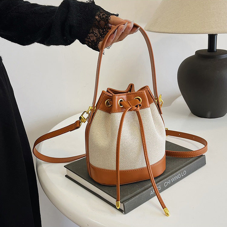 Canvas and Leather Bucket Bag with Drawstring and Gold Hardware