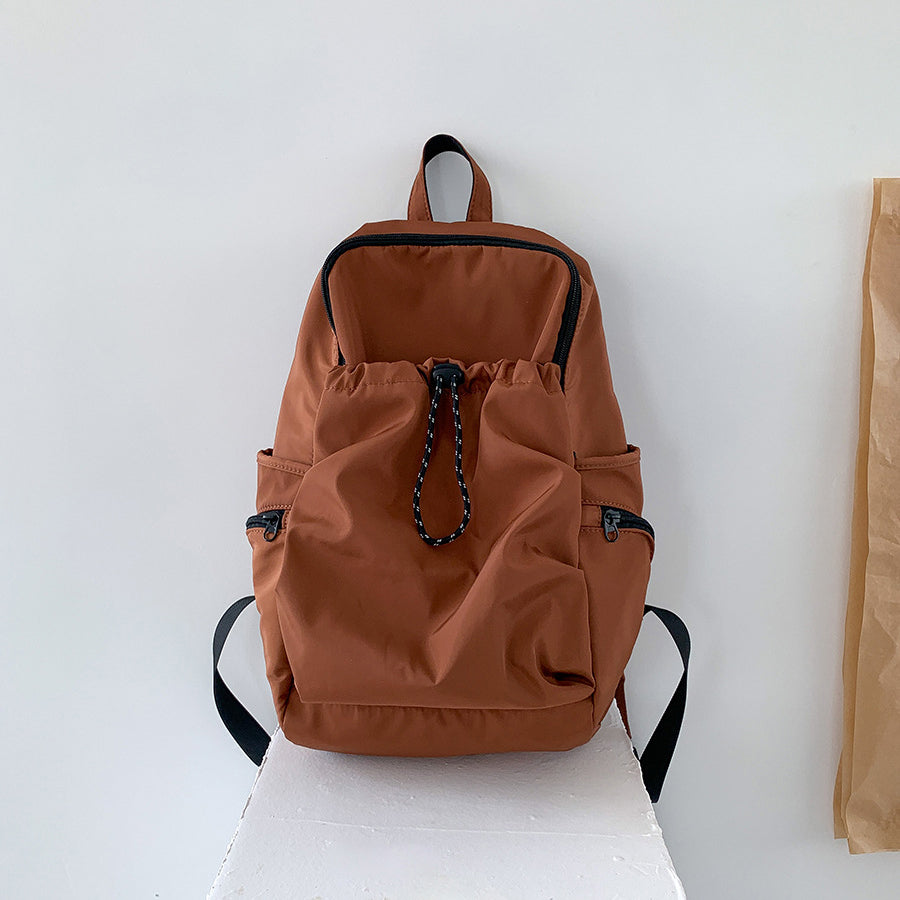 Casual Nylon Backpack with Drawstring Front Pocket