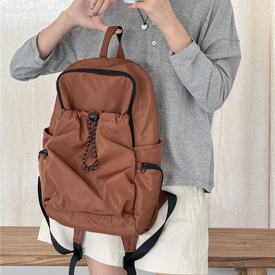 Casual Nylon Backpack with Drawstring Front Pocket