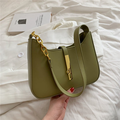 Chic Leather Shoulder Bag with Gold Chain and Bar Closure
