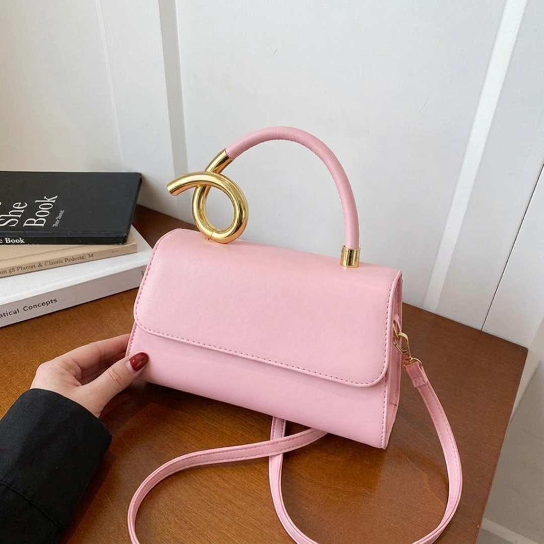 Chic Leather Shoulder Bag with Sculptural Gold Handle