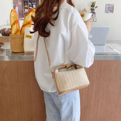 Chic Straw Crossbody Bag with Black Trim and Gold Hardware