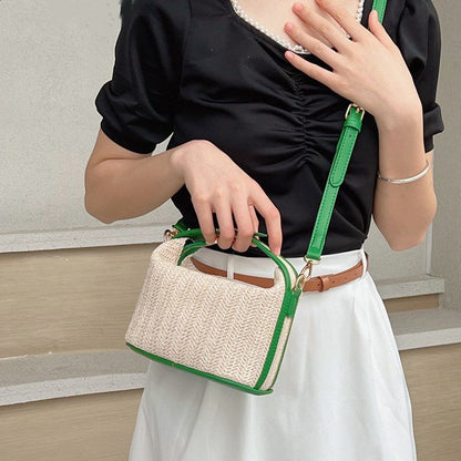 Chic Straw Crossbody Bag with Black Trim and Gold Hardware
