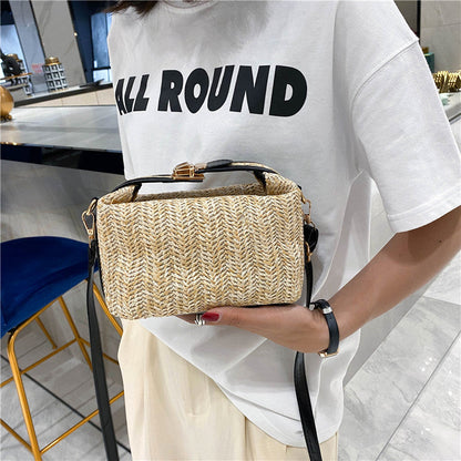 Chic Straw Crossbody Bag with Black Trim and Gold Hardware