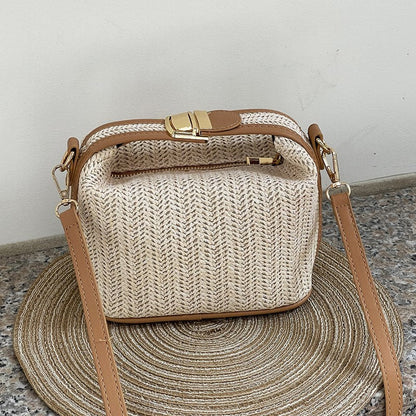 Chic Straw Crossbody Bag with Black Trim and Gold Hardware