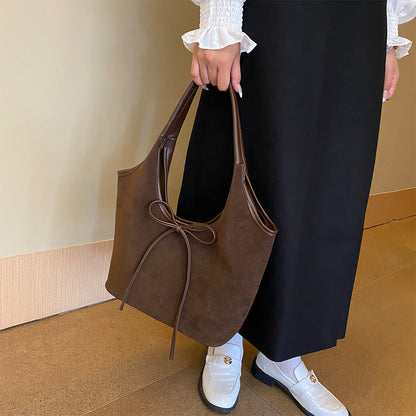 Chic Suede Shoulder Bag with Bow Detail