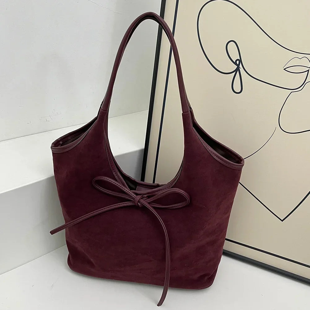 Chic Suede Shoulder Bag with Bow Detail