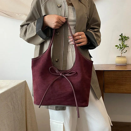 Chic Suede Shoulder Bag with Bow Detail