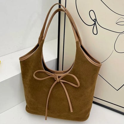 Chic Suede Shoulder Bag with Bow Detail
