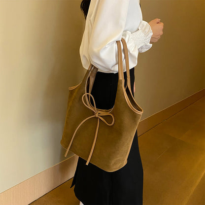 Chic Suede Shoulder Bag with Bow Detail