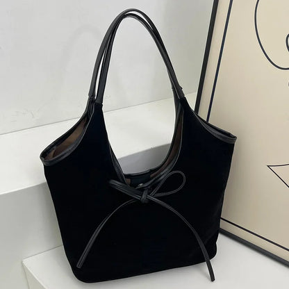 Chic Suede Shoulder Bag with Bow Detail