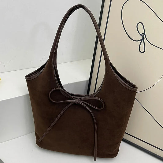 Chic Suede Shoulder Bag with Bow Detail