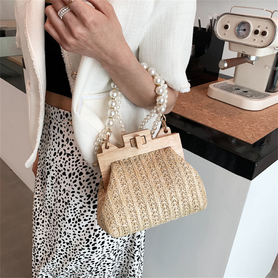 Chic Woven Straw Bag with Pearl Handle and Wood Clasp