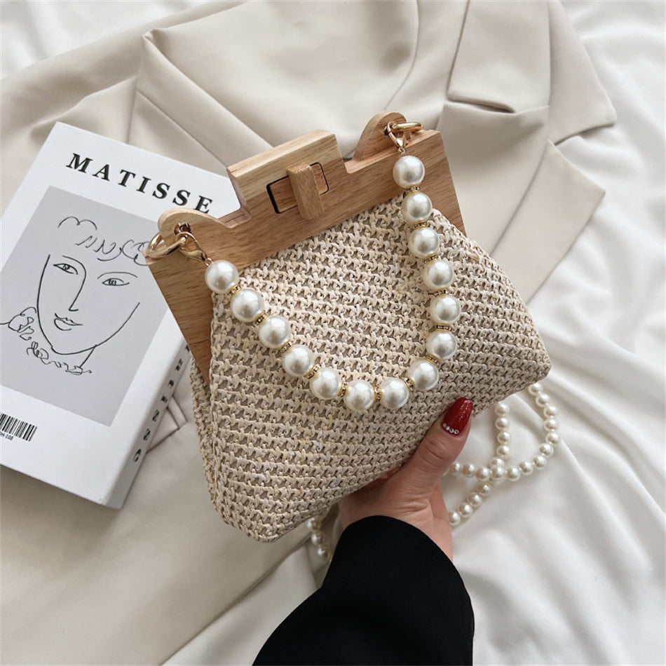 Chic Woven Straw Bag with Pearl Handle and Wood Clasp