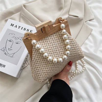 Chic Woven Straw Bag with Pearl Handle and Wood Clasp