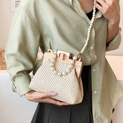 Chic Woven Straw Bag with Pearl Handle and Wood Clasp