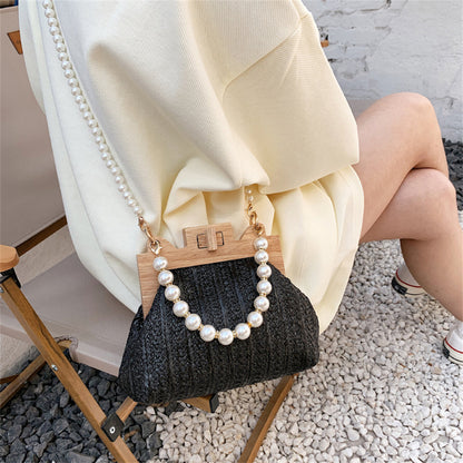 Chic Woven Straw Bag with Pearl Handle and Wood Clasp