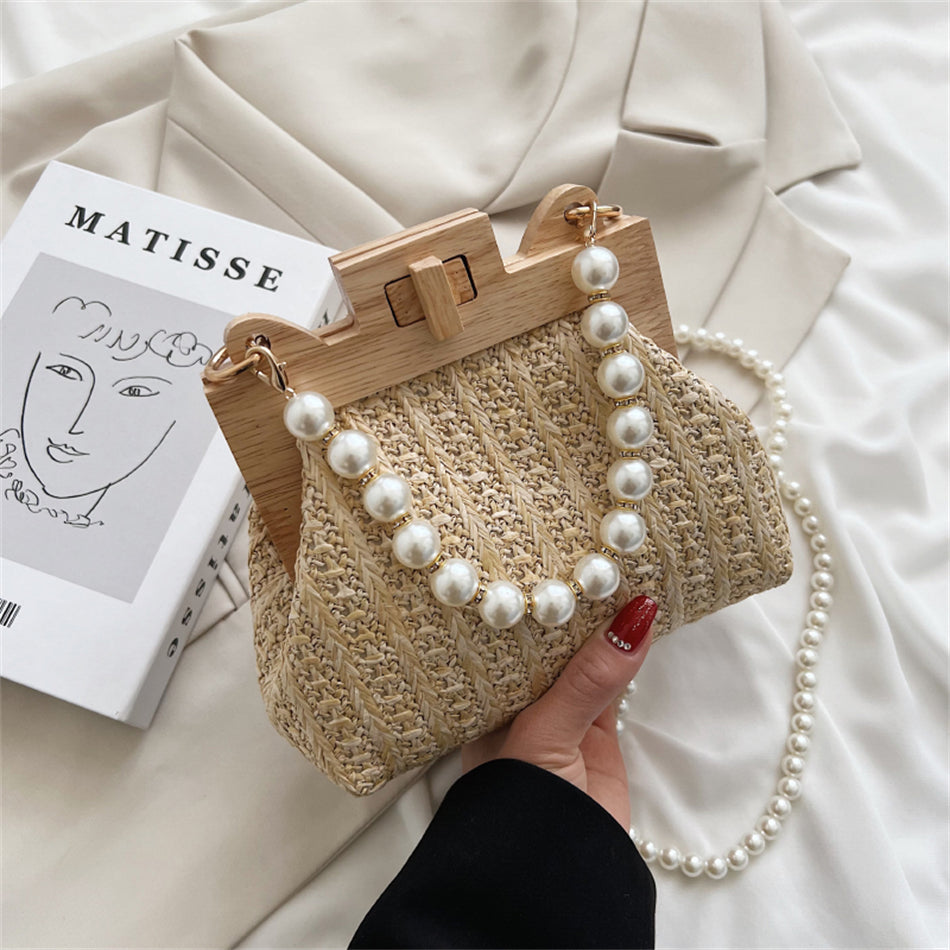 Chic Woven Straw Bag with Pearl Handle and Wood Clasp