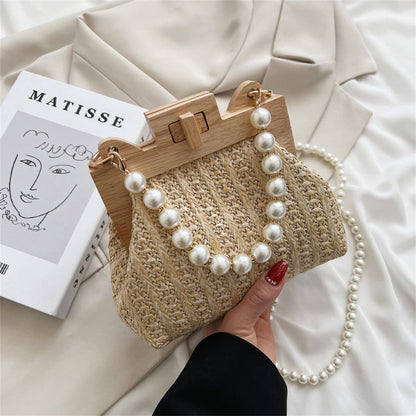 Chic Woven Straw Bag with Pearl Handle and Wood Clasp