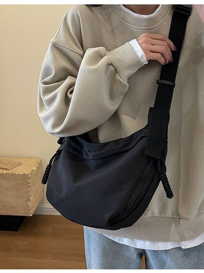 Crossbody Bag with Braided Cord Detail and Front Zip Pocket