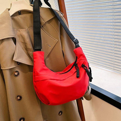 Crossbody Bag with Braided Cord Detail and Front Zip Pocket