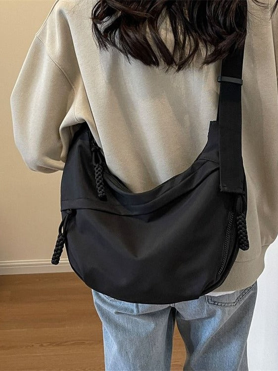 Crossbody Bag with Braided Cord Detail and Front Zip Pocket