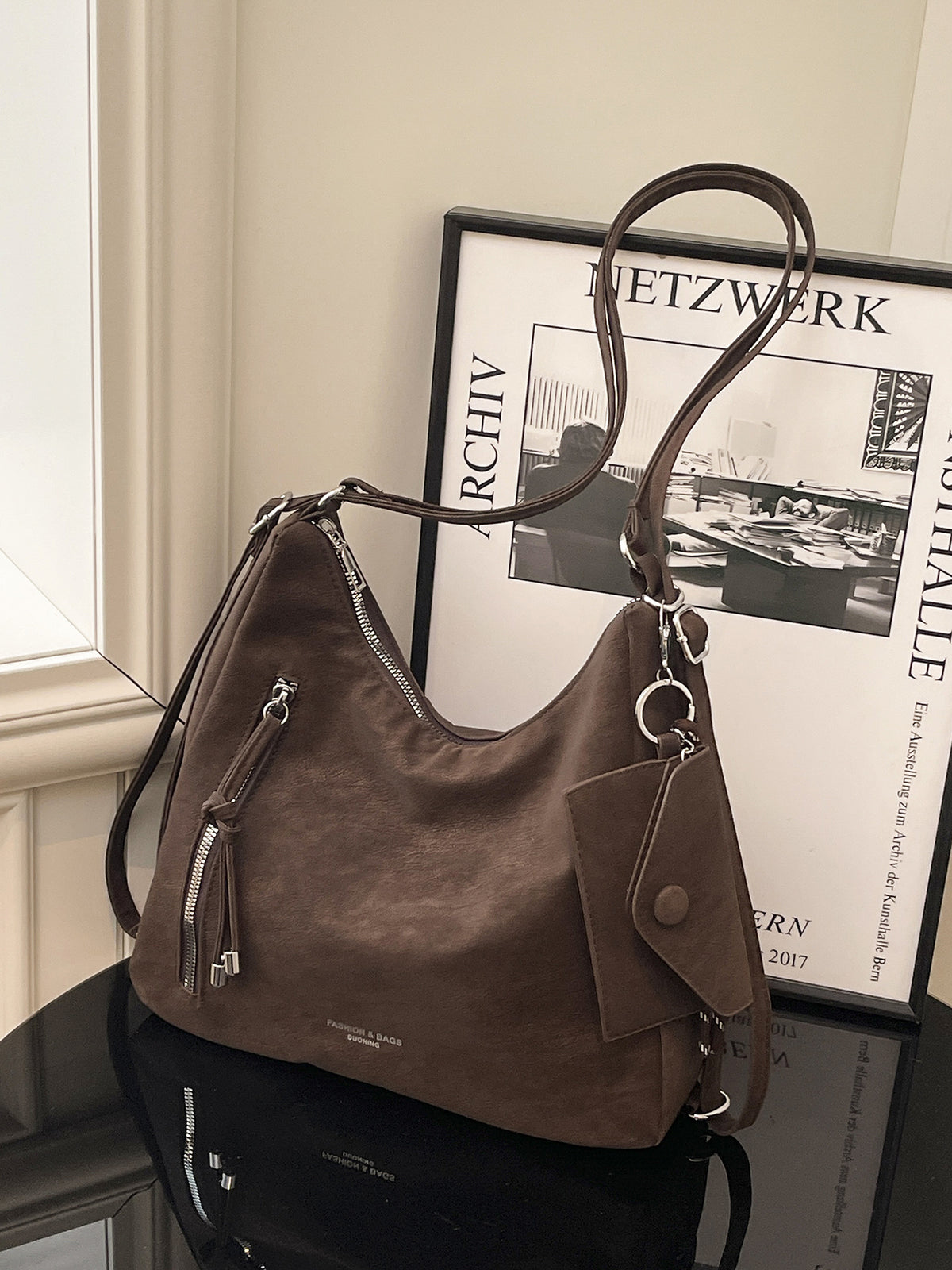 Large Leather Shoulder Bag with Side Zip Pocket and Silver Hardware
