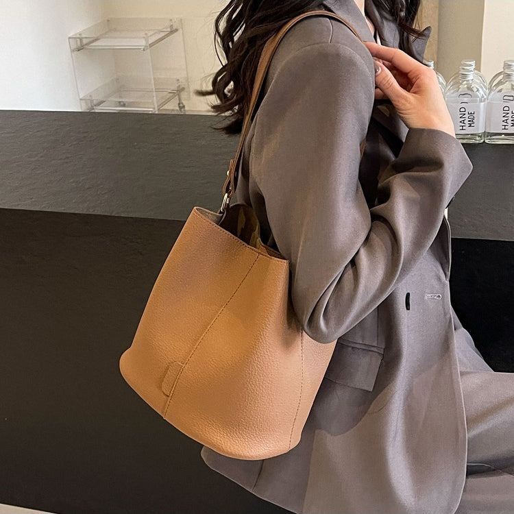 Leather Bucket Bag with Adjustable Shoulder Strap and Gold Hardware