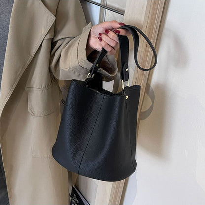 Leather Bucket Bag with Adjustable Shoulder Strap and Gold Hardware