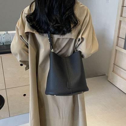 Leather Bucket Bag with Adjustable Shoulder Strap and Gold Hardware