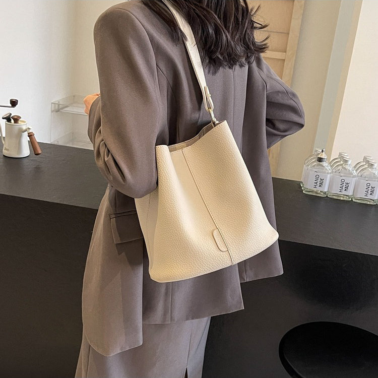 Leather Bucket Bag with Adjustable Shoulder Strap and Gold Hardware