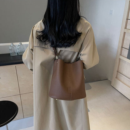 Leather Bucket Bag with Adjustable Shoulder Strap and Gold Hardware