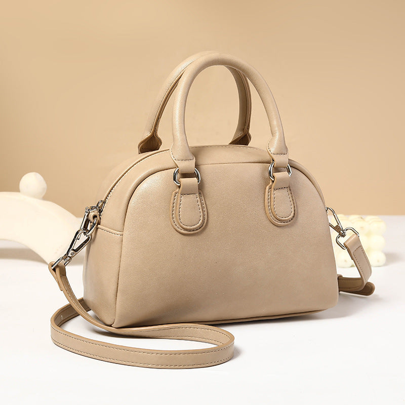 Polished Leather Shoulder Bag with Top Handles and Crossbody Strap