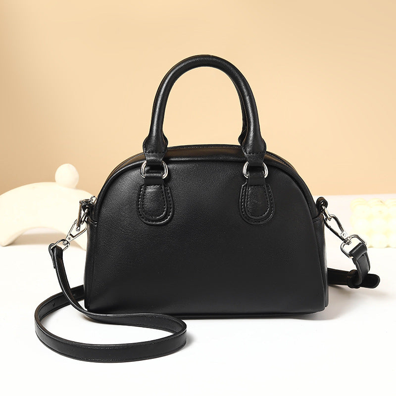 Polished Leather Shoulder Bag with Top Handles and Crossbody Strap