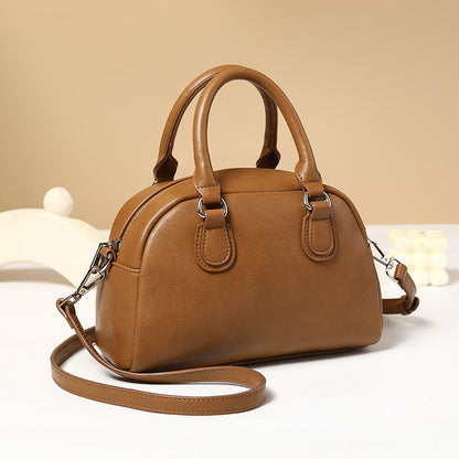 Polished Leather Shoulder Bag with Top Handles and Crossbody Strap