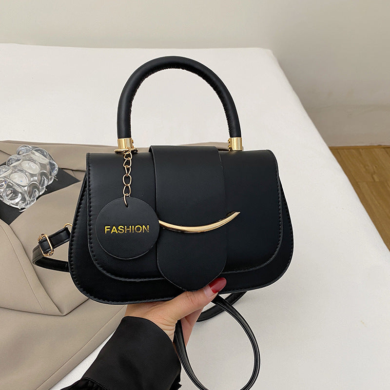 Polished Leather Top Handle Bag with Gold Hardware and Crossbody Strap